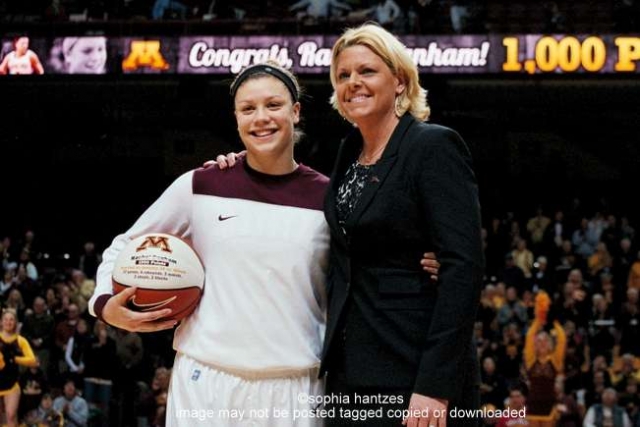 Sophomore Guard Rachel Banham was awarded the game ball for scoring her career 1000th point in the Minnesota vs Illinois game on 01.28.12 Pictured l-r Rachel Banham Coach Pam Borton 